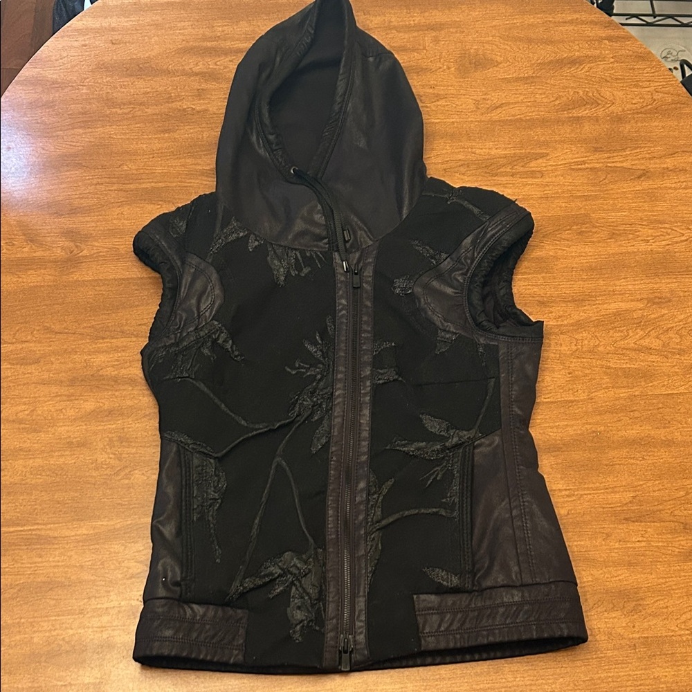 Stylish Black Hooded Vest with Leather Details